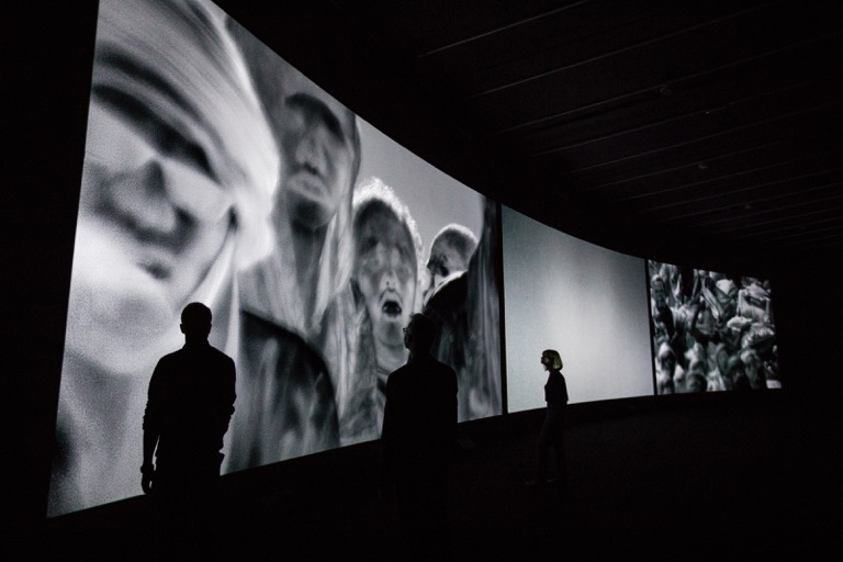 Richard Mosse in collaboration with Trevor Tweeten and Ben Frost. Incoming, 2017; Installation view. The Curve, Barbican Centre, 15 Feb - 23 April 2017. Photo: Tristan Fewings / Getty images