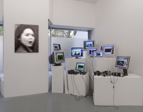 John Smith, unusual Red cardigan, installation view at PEER, London, 2011. Photo: Chris Dorley-Brown.  