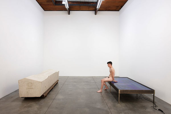 Roger Hiorns; Untitled (Security Object), 2013; cast stone; and Untitled (Surface 2), 2014; Steel, flat screen and youth; © Roger Hiorns; Courtesy of the artist and Luhring Augustine, New York.