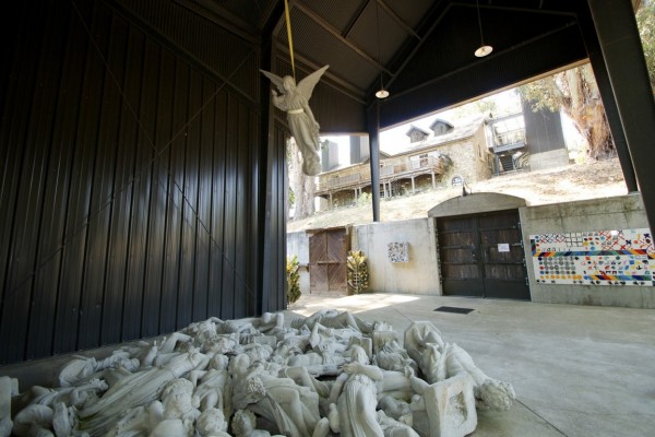 David Ireland. Angel-Go-Round, 1996; fiberglass, cast concrete figures and motor; 180 x 191 x 191 in. Courtesy of di Rosa collection, Napa. Photo: Israel Valencia.