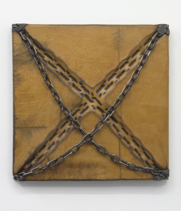 Davina Semo. SHE FOUGHT WITH THE KID WHO THREW ROCKS AT HER DOG, 2015; leather, pigmented reinforced concrete, waxed steel chain; 18 x 18 x 2 1/2 in. Courtesy of the Artist and CAPITAL, San Francisco.