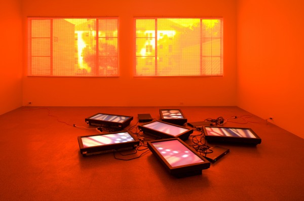 Diana Thater. Untitled Videowall (Butterflies), 2008. Six video monitors, player, one fluorescent light fixture, and Lee filters; dimensions variable. Installation view at 1301PE, Los Angeles, 2008. ©Diana Thater; photo ©Fredrik Nilsen, courtesy 1301PE, Los Angeles. 
