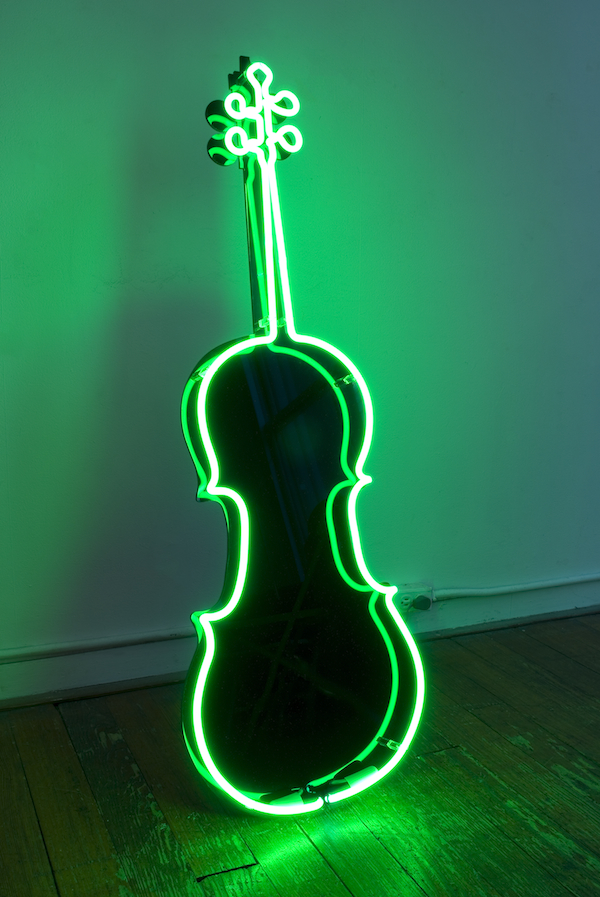 Charlotte Moorman. Neon Cello, ca. 1989; Plexiglas, neon, and electrical parts; 48 1/2 × 16 in. Photo: João Simões. Courtesy of Emily Harvey Foundation.