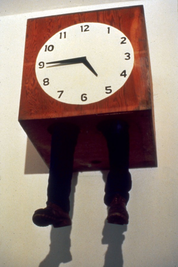 Charles Ray. Clock Man, 1978; wood, paint, human body; 30 x 30 x 54 in. Courtesy of the Artist.